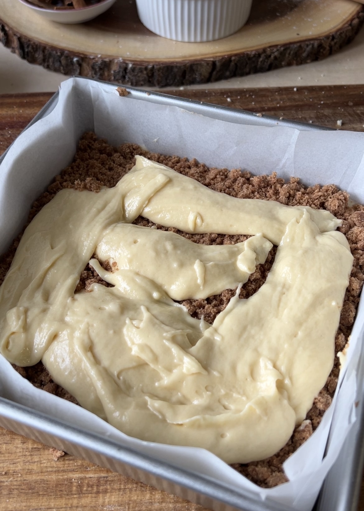 Cinnamon coffee cake batter in a pan