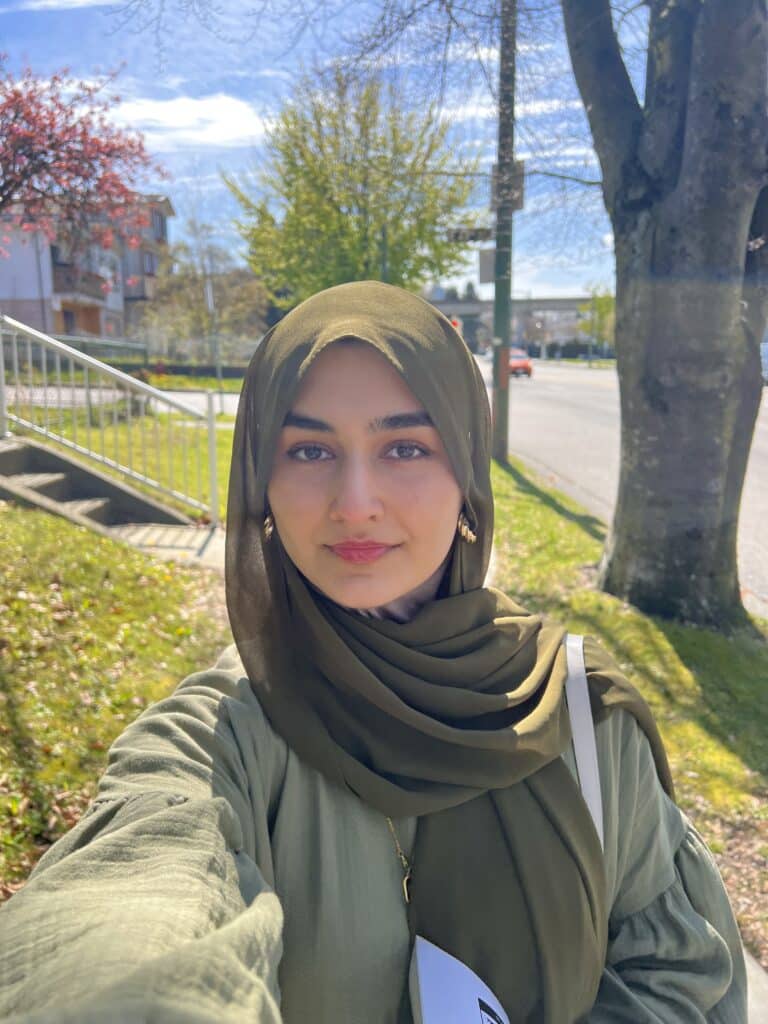 girl in green hijab on a sunny day nombeah