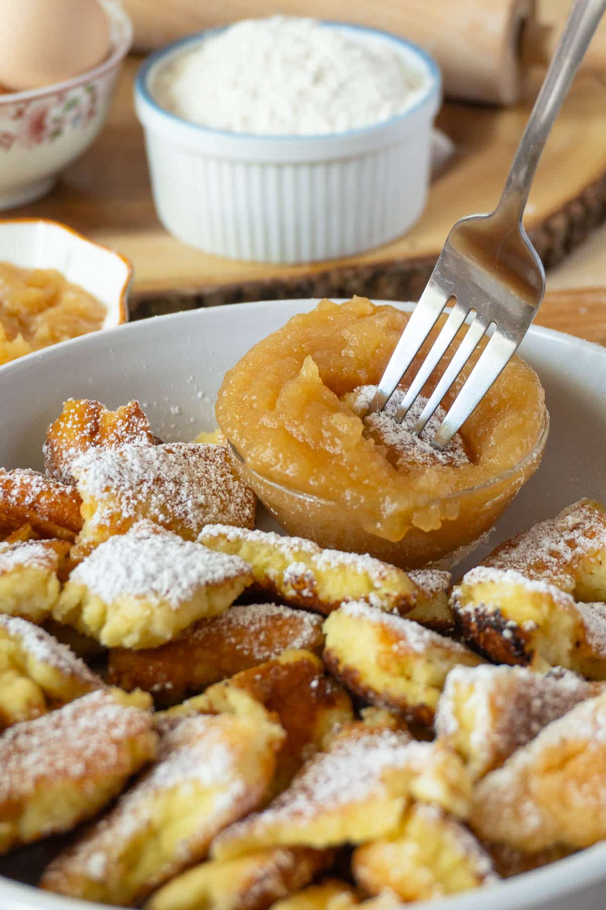 shredded pancakes on a plate - kaiserschmarnn