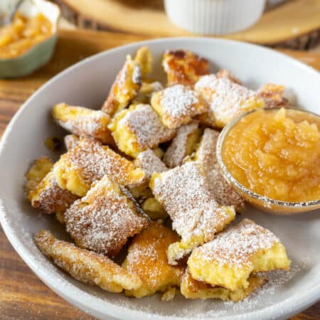 shredded pancakes on a plate - kaiserschmarnn