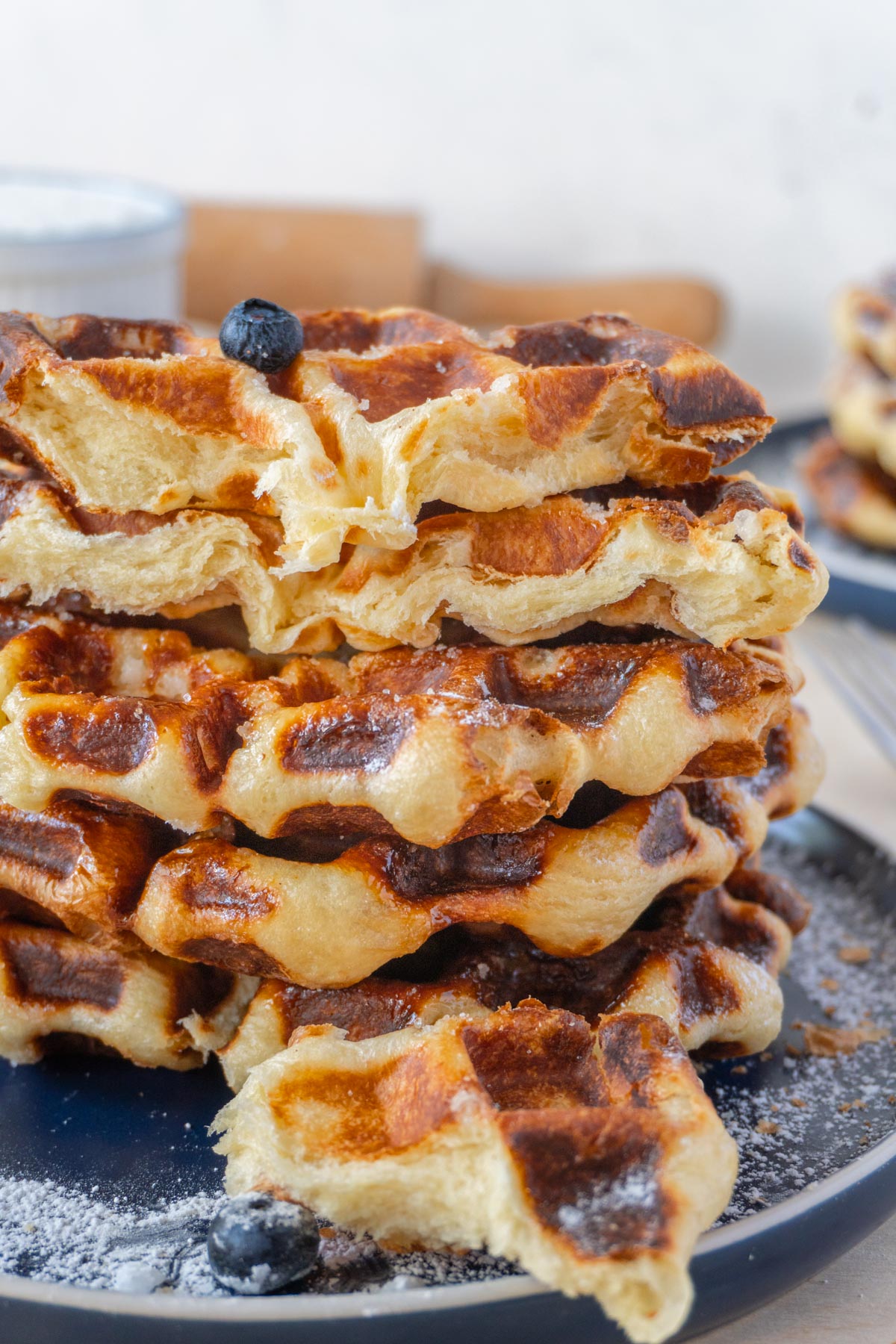 stack of liege waffles on a blue plate