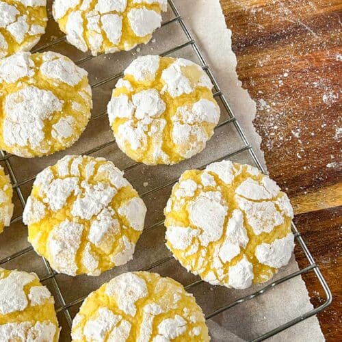 yellow lemon crinkle cookies on a rack