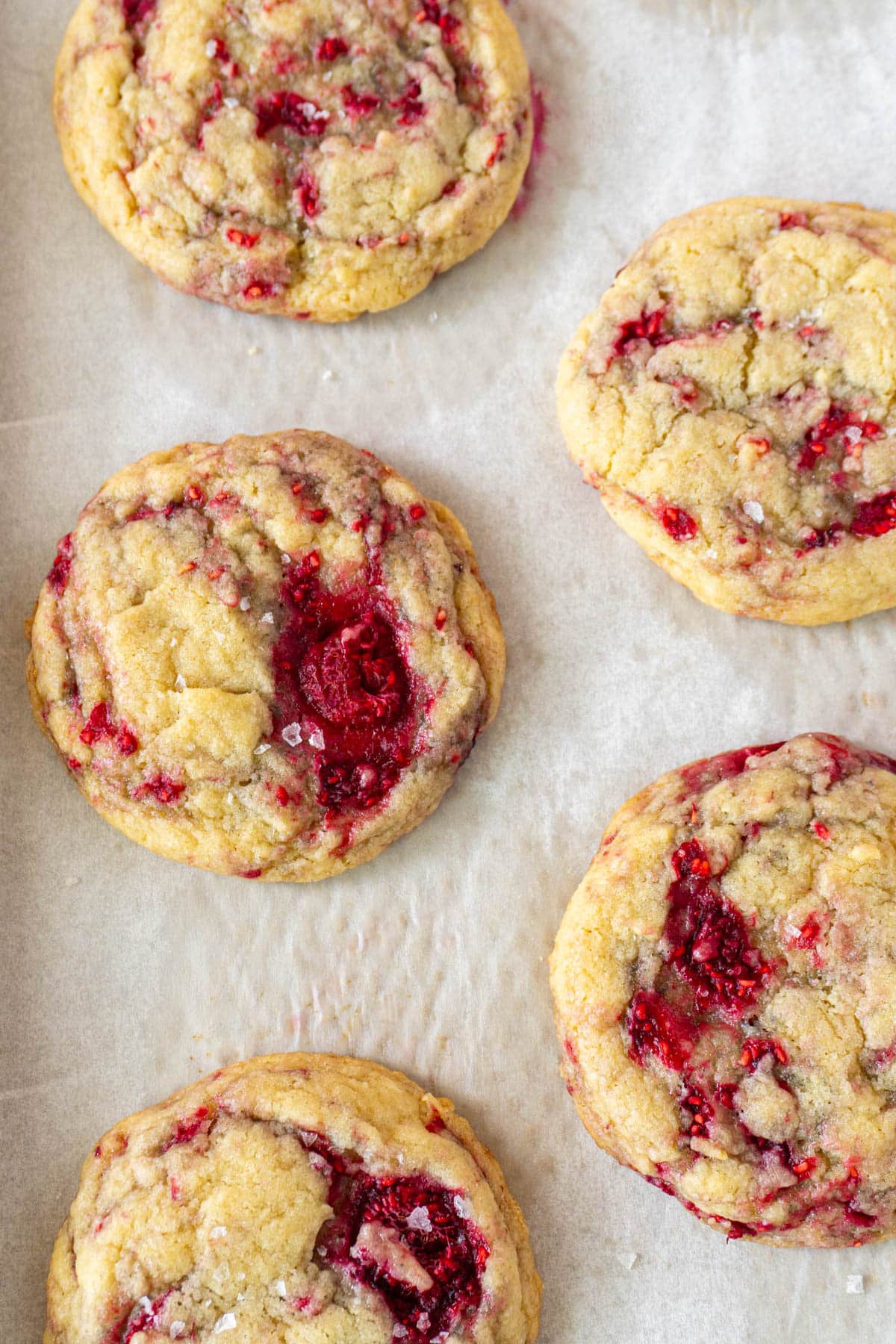 5 Vanilla raspberry cookies on a pan