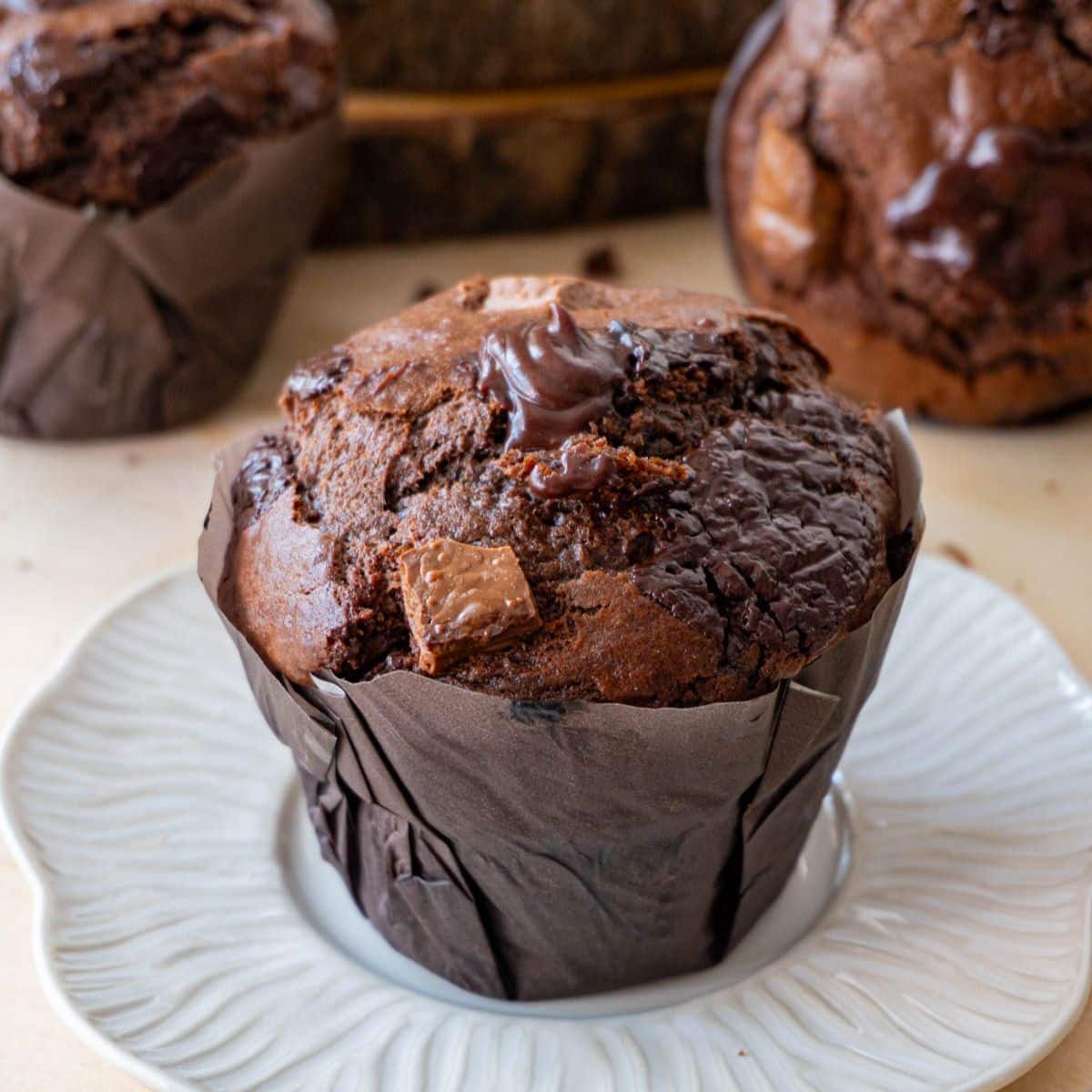 Olympic Double Chocolate Muffin on a white plate