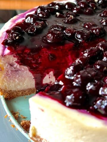 Blueberry lemon cheesecake with blueberry sauce on top