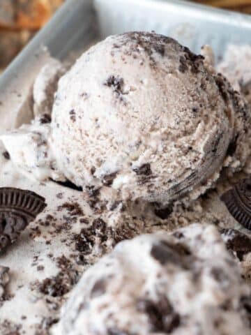 a scoop of cookies and cream ice cream in a container