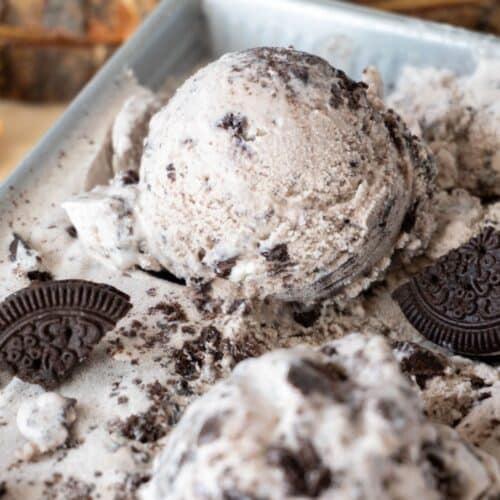 a scoop of cookies and cream ice cream in a container