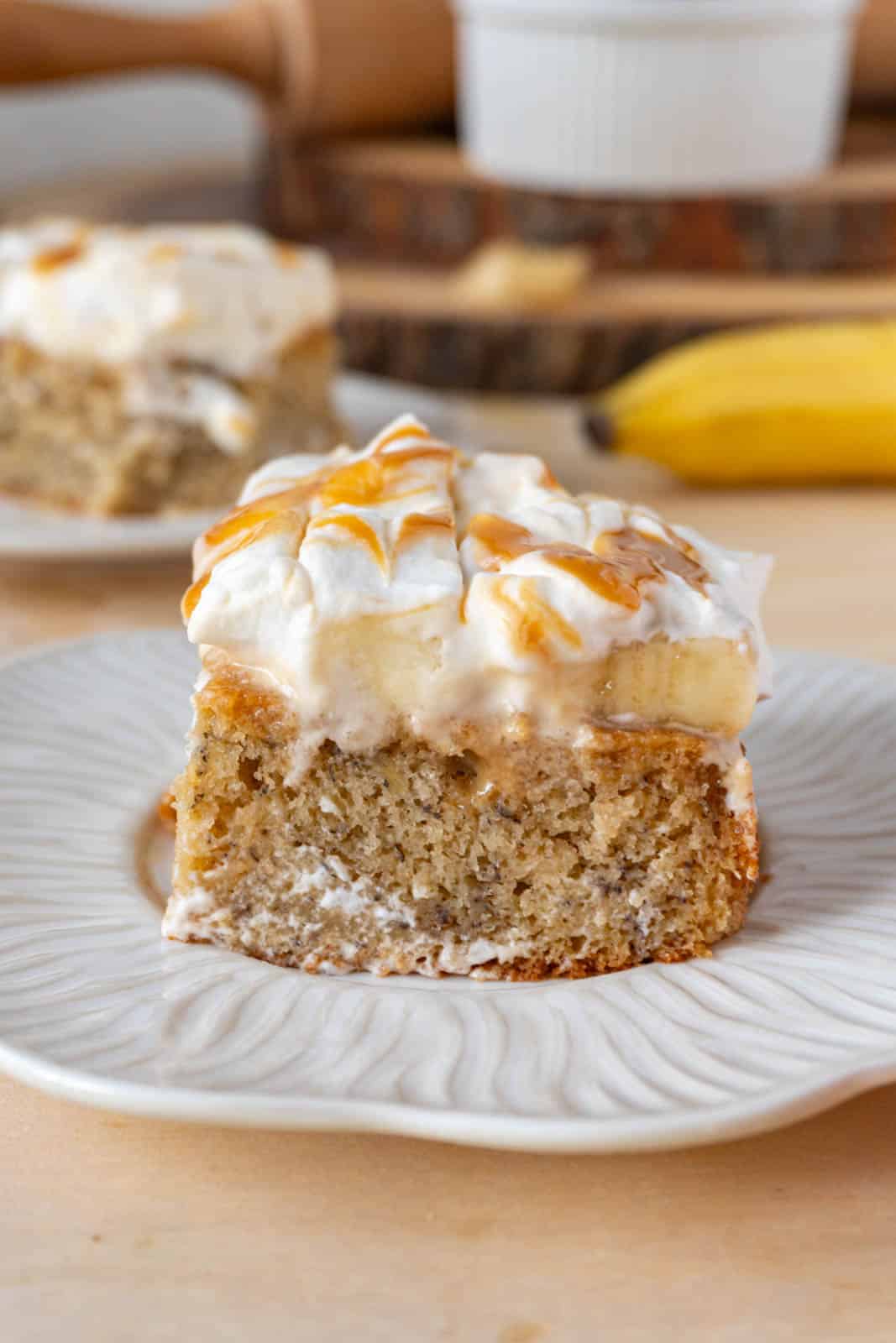 banoffee cake slice in a white plate