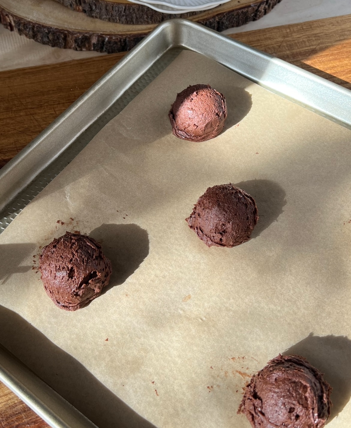 Cookies scooped onto a baking sheet