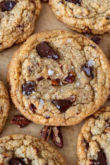 pecan chocolate chip cookies on a pan