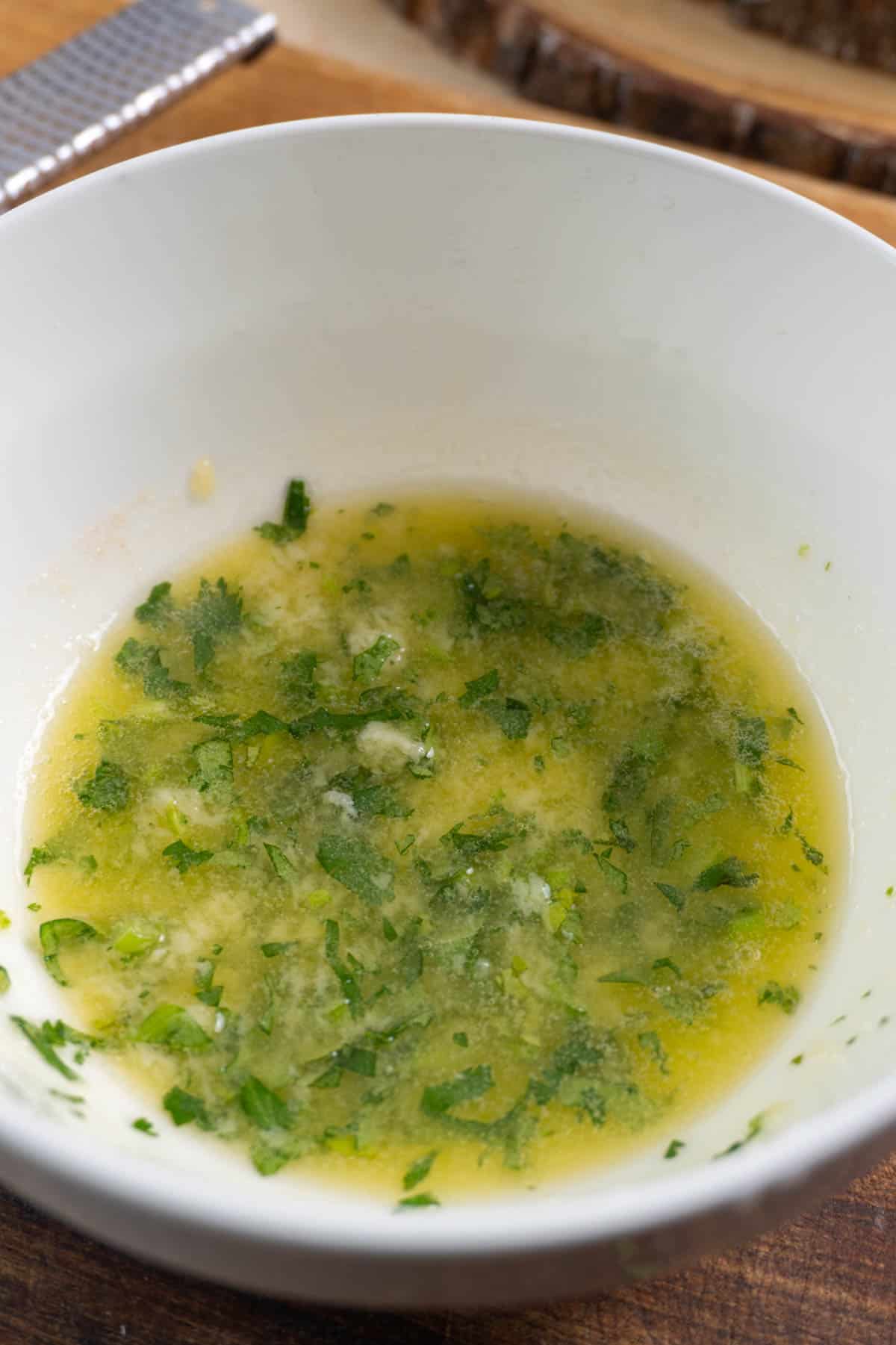 garlic butter in a white bowl