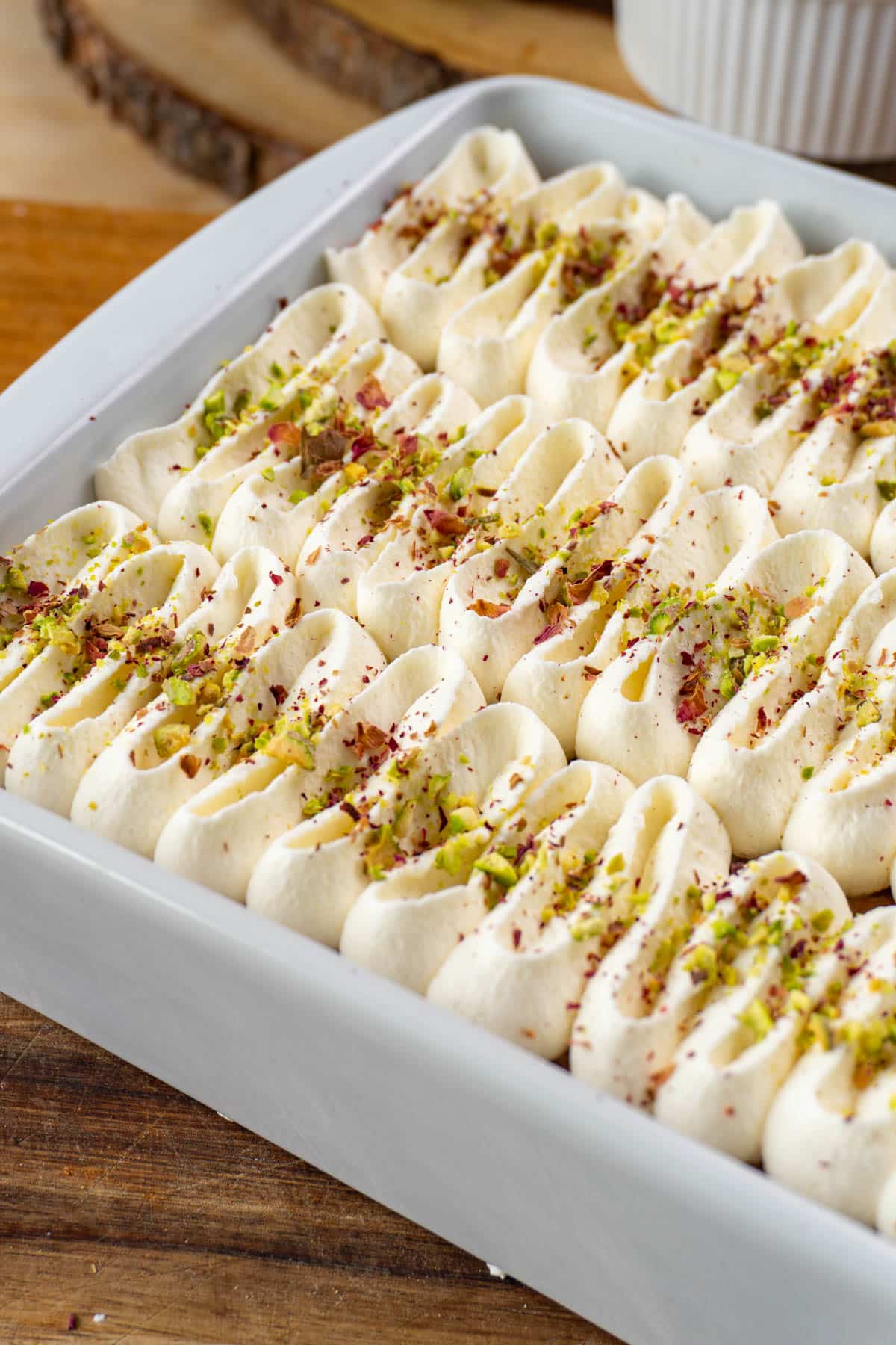 rasmalai tres leches cake in a white pan