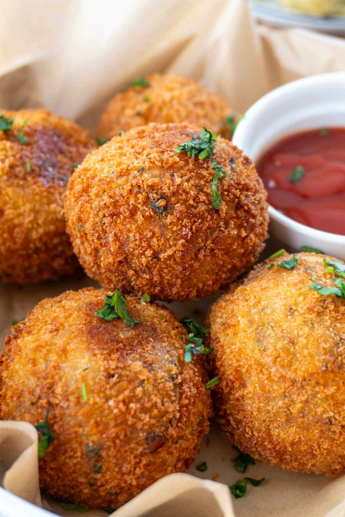 3 potato cheese balls in a plate